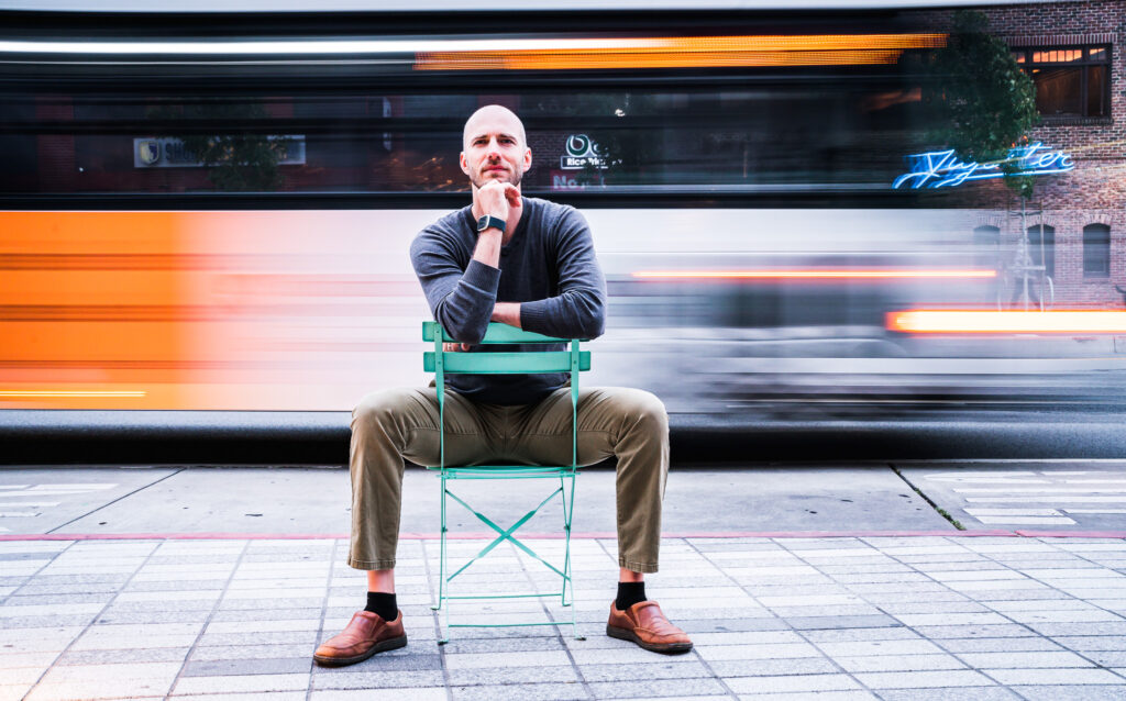 Online dating profile picture of man intimately staring at photographer